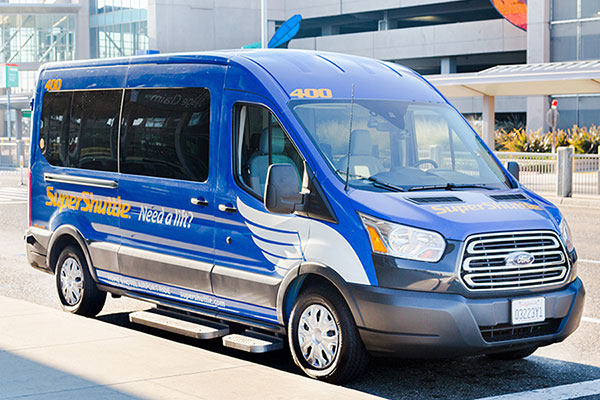 blue van airport shuttle