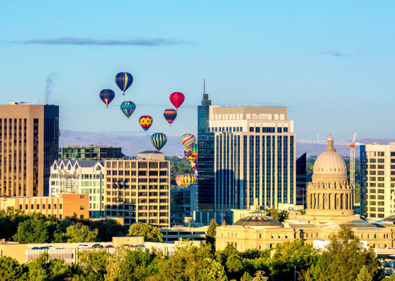 City of Boise skyline with hot air balloons