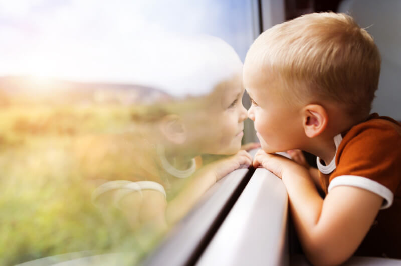 Little boy travelling in train