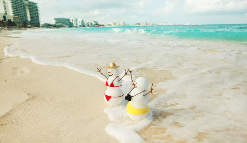 snowmen on beach